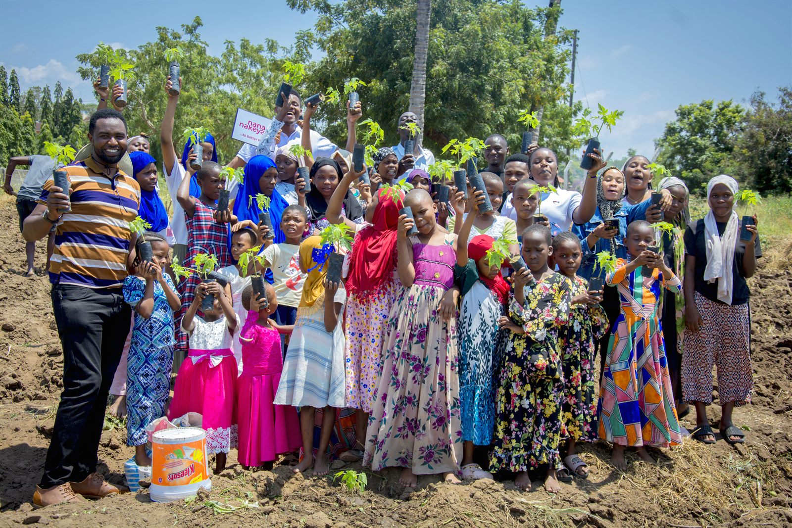Children learning with support from a mentor
