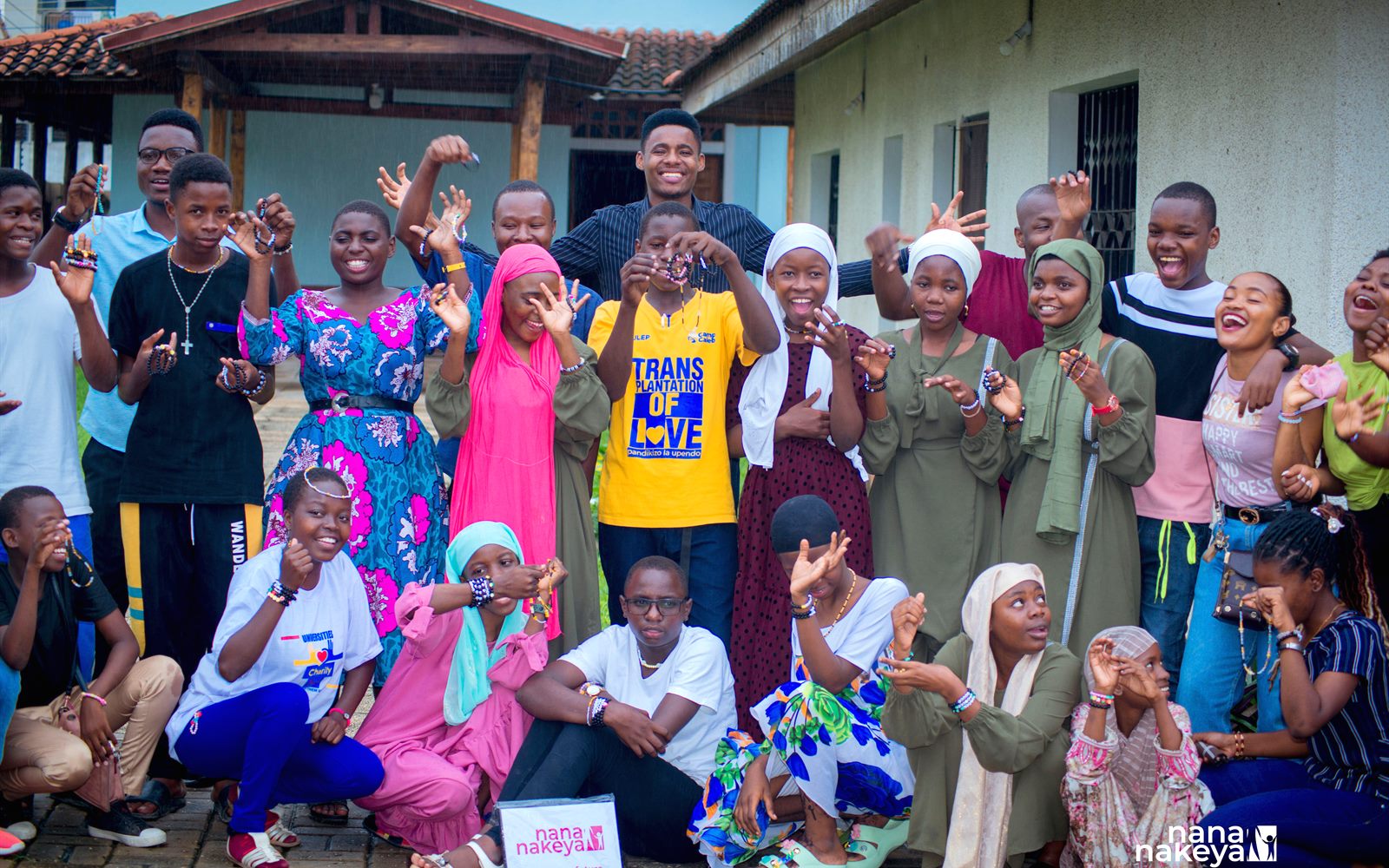 Community members supporting children